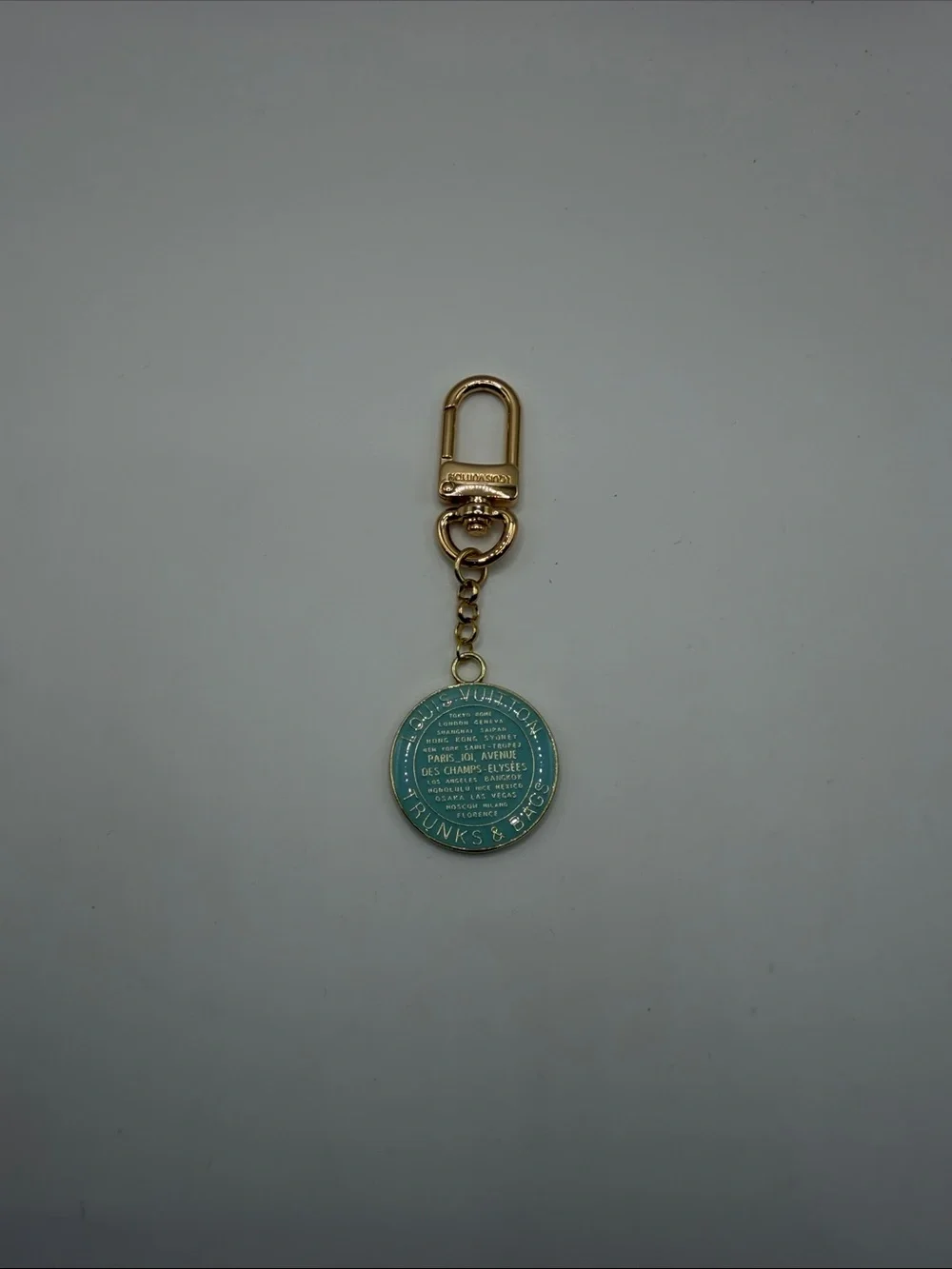 1489. Gold and Teal Round Keychain Charm